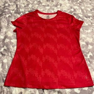 I am selling a Danskin Now dri-fit t-shirt , it is pink , size - LG (12-14)